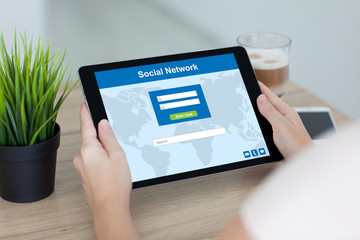 woman holding tablet computer social network screen phone and co