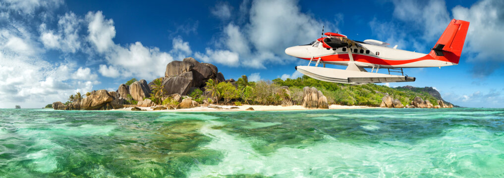 Seaplane with Seychelles island