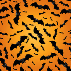 Seamless pattern with bats. Black bats on orange background. Background for Halloween. Vector illustration