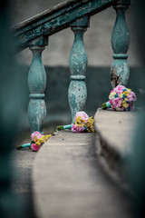 Wedding pink flowers bouquet on grey stairs