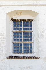 Fototapeta premium Old window in historic building
