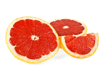 Naklejka na ściany i meble Slices of grapefruit isolated on white background