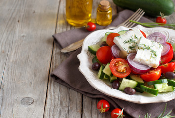 Greek salad on a wooden table