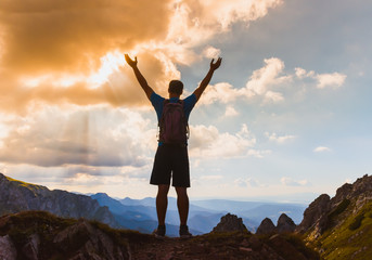 man on the top of a rock