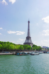 Fototapeta na wymiar famous Eiffel Tour over water of Seine river, Paris, France