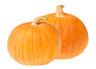 two small yellow pumpkins on white