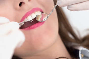 Young woman patient at the dentist