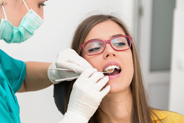 Young woman patient at the dentist