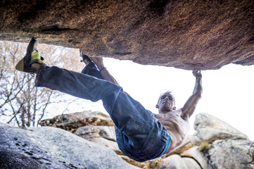 Man is climbing the mountains.