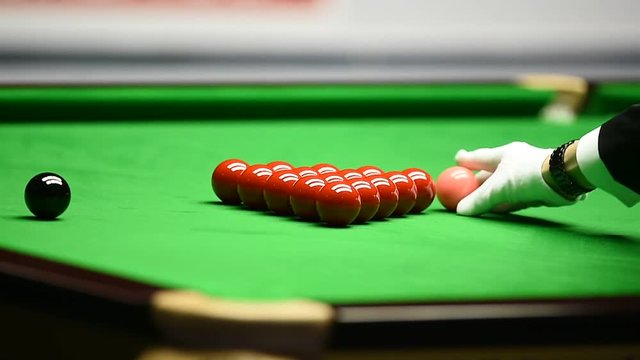 Detail video with snooker player hitting the ball during competition