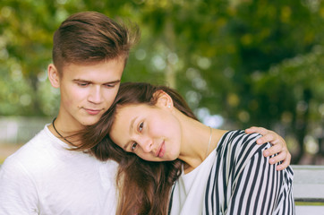 Romantic couple together in a park in autumn