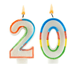 Burning birthday candles isolated on white background, number 20