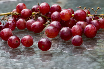 red grape on glass table