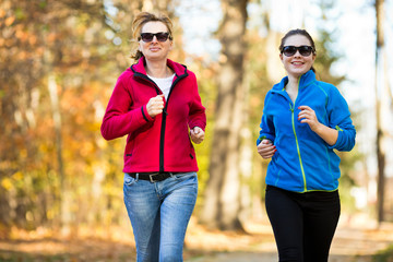 Two women running 