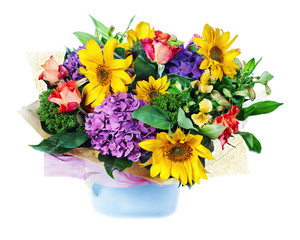 Colorful floral bouquet of roses, lilies, sunflowers and irises arrangement centerpiece in vase isolated on white background.