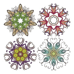 Fototapeta na wymiar Set of ornate vector mandala symbols. Mehndi lace tattoo. Art Nouveau weave.