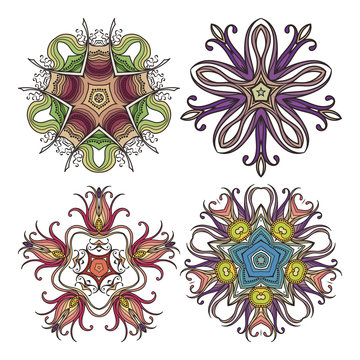 Set of ornate vector mandala symbols. Mehndi lace tattoo. Art Nouveau weave.