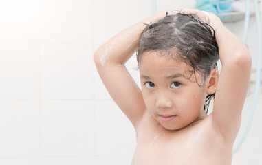 cute girl washing hair