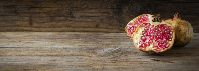 Pomegranate on wood
