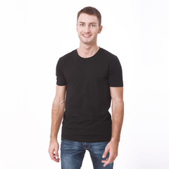 Fototapeta premium t-shirt design and people concept - close up of young man in blank white t-shirt. Clean shirt mock up for design