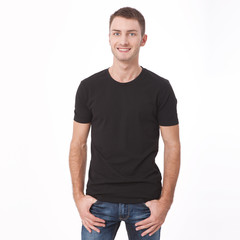 Obraz premium t-shirt design and people concept - close up of young man in blank white t-shirt. Clean shirt mock up for design