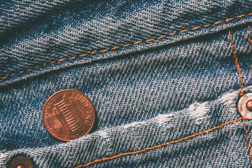 American coin in jeans pocket