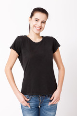 Fototapeta premium T-shirt design and people concept - close up of young woman in blank white t-shirt. Clean shirt mock up for design
