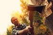 Lumberjack chopping wood in the forest. Axe closeup