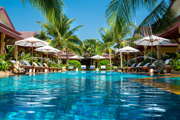 beautiful swimming pool in tropical resort , Phuket, Thailand - obrazy, fototapety, plakaty
