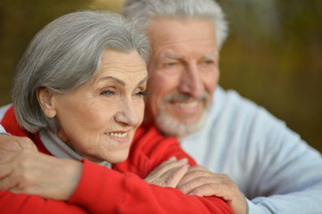 Senior couple in autumn park