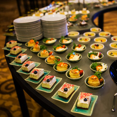 Close-up view of dessert buffet with delicious sweet bakery and