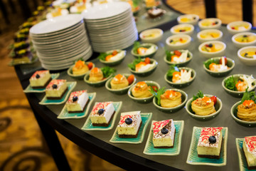Close-up view of dessert buffet with delicious sweet bakery and