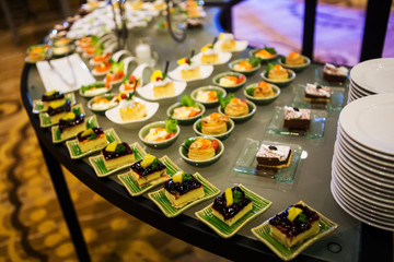 Close-up view of dessert buffet with delicious sweet bakery and