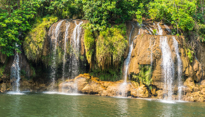Fototapeta na wymiar Waterfall view at the river Kwai, Kanchanaburi, Thailand.