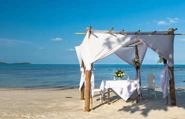 Wedding ceremony dining place on a tropical beach of Koh Samui i