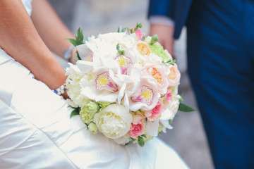 nice wedding bouquet in bride's hand