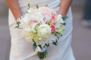 nice wedding bouquet in bride's hand