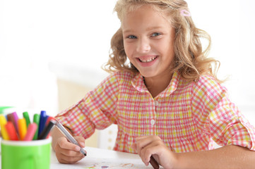 Little student girl at art class