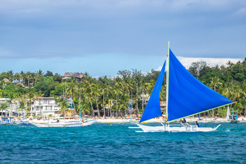 Traditional philippines sailing boats at White Beach of Boracay