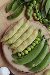 Peas crispy baked and fresh green peas pod.