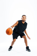 Portrait of a handsome african man playing in basketball