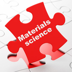 Science concept: Materials Science on puzzle background