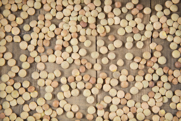 Lentil beans on wooden table - Lens culinaris