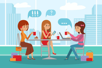 Three beautiful women talking at coffee shop while drinking and using phone laptop