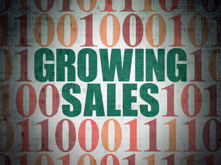 Finance concept: Growing Sales on Digital Data Paper background