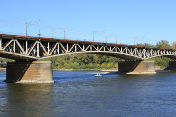 Fototapeta na wymiar Railway bridge across the Vistula river in Warsaw