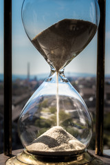 Hourglass with the sky in the background