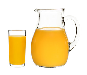 peach juice in a glass and carafe