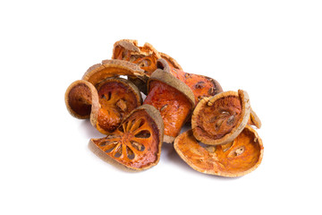 dried quince slices on a white background