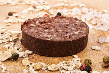 irish black pudding with peppercorn, oatmeal and coarse salt